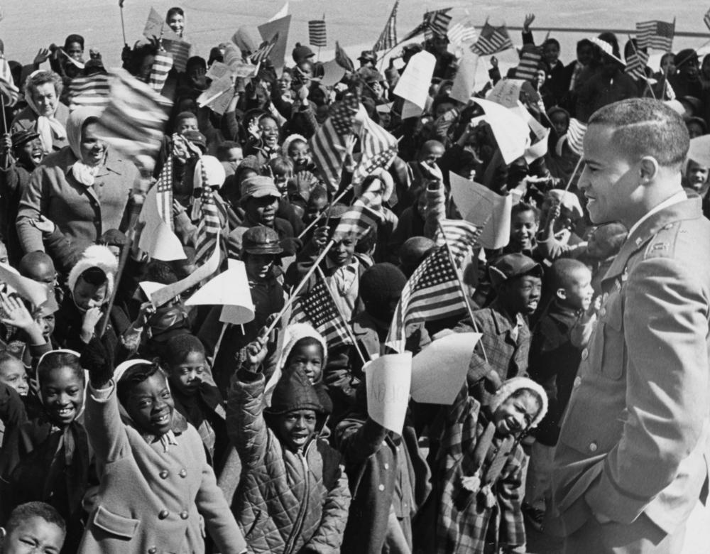Air Force Captain Edward J. Dwight, Jr. gets a hero's welcome from youngsters at Langdon Elementary School in Washington, D.C. in 1964.