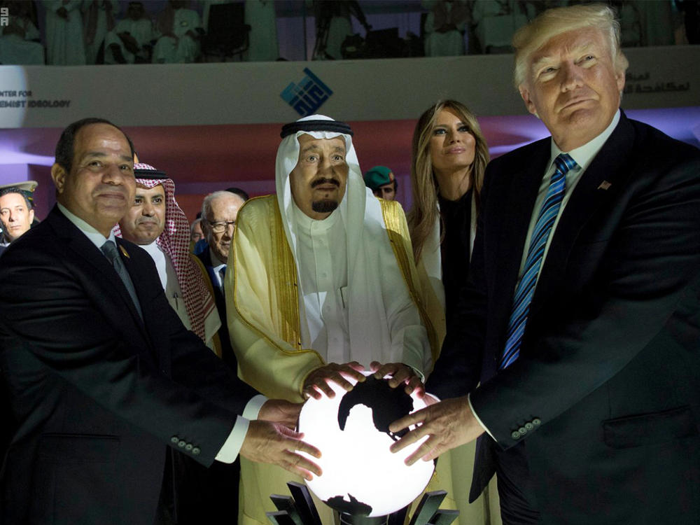 In this 2017 file photo from the Saudi Press Agency, Egyptian President Abdel Fattah al-Sissi, Saudi King Salman, and former President Donald Trump open a center to combat extremism in Riyadh.