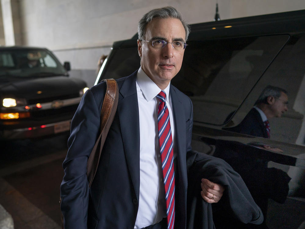 Former White House counsel Pat Cipollone departs the Capitol following defense arguments in the impeachment trial of President Donald Trump on charges of abuse of power and obstruction of Congress in 2020.