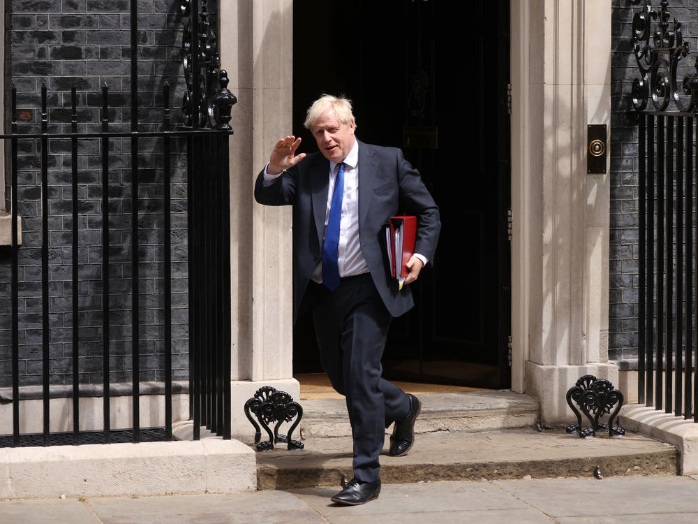 Boris Johnson leaves 10 Downing St. to face questions in the House of Commons in London on Wednesday.