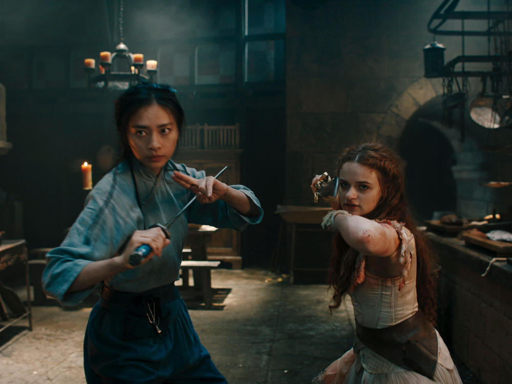 Ngô Thanh Vân as Linh and Joey King as The Princess in the new Hulu film <em>The Princess</em>.