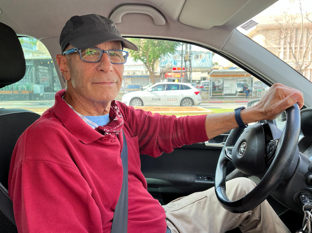 Arnon Avni, 69, an Israeli graphic designer and political cartoonist, volunteers with Road to Recovery, a group of Israelis who drive Palestinian patients to their medical appointments. Avni gave a ride to Yousef Al-Kurd, the Gaza resident seeking heart bypass surgery at a hospital in the West Bank.