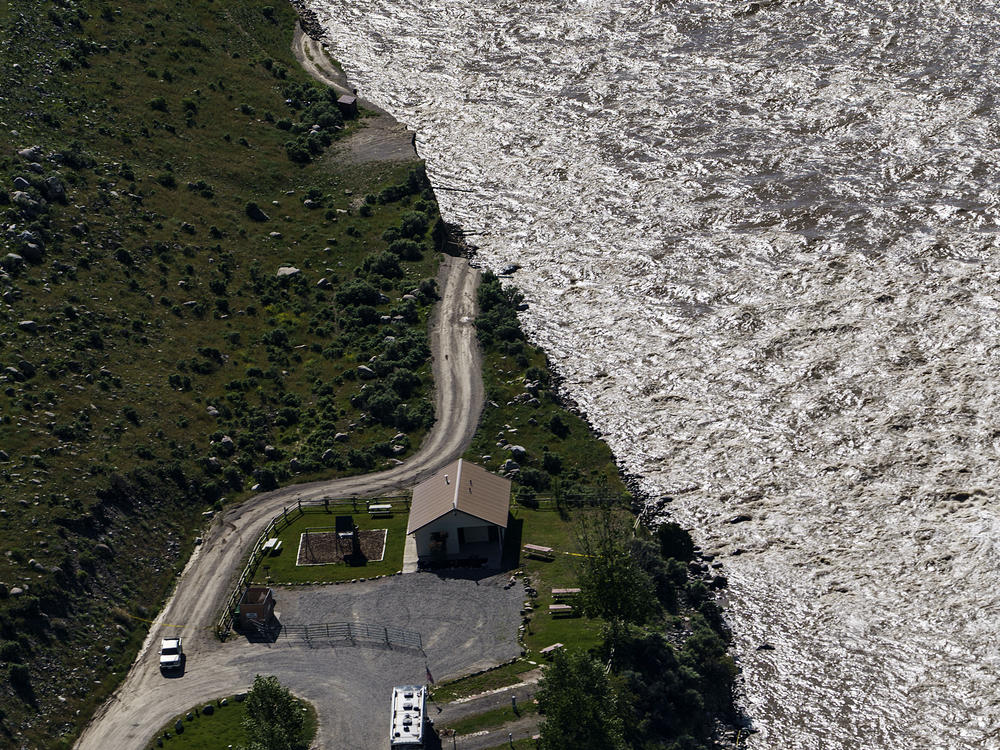 A road ends where floodwaters washed away a house in Gardiner, Mont., on June 16, 2022.