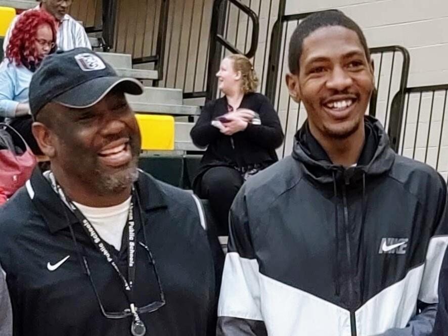 Jayland Walker (right) with his former wrestling coach Robert Hubbard in February 2020.