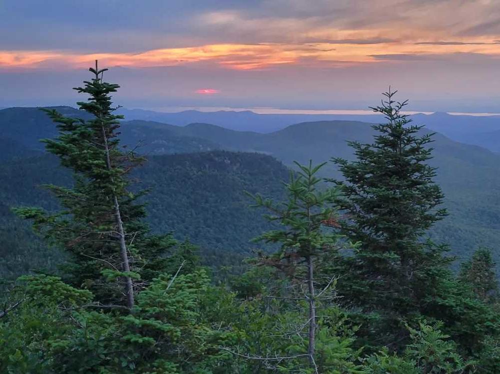 Watching the sun rise from a mountain summit is a special summer delight.  To make it happen, you have to start the hike in the dark.