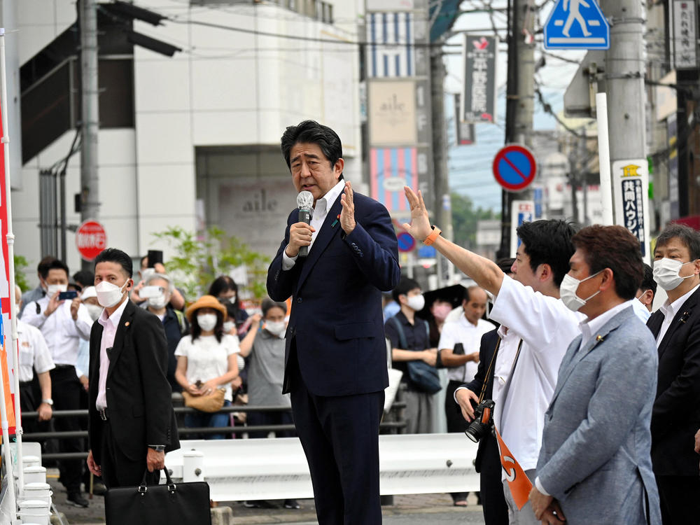 Former Japanese Prime Minister Shinzo Abe makes a speech before he was shot from behind by a man in Nara, a city in western Japan, on Friday.