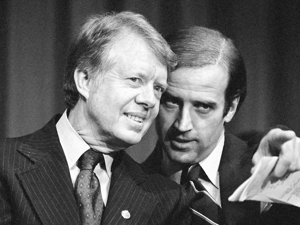 Then-President Jimmy Carter listens to then-Sen. Joe Biden, as they wait to speak at fundraising reception at Padua Academy in Wilmington, Del., in February 1978.
