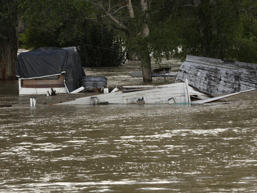 Floodwaters inundated property June 13 along the Clarks Fork Yellowstone River near Bridger, Mont. The flooding across parts of southern Montana and northern Wyoming forced the indefinite closure of entrances to Yellowstone National Park just as a summer tourist season that draws millions of visitors annually was ramping up.