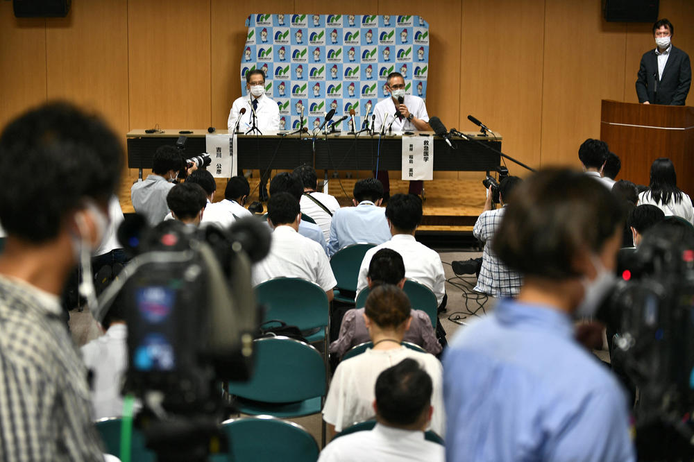 Kimihiko Kichikawa (center left), the head of the university hospital, and Hidetada Fukushima (center right), professor of emergency medicine at the Nara Medical University Hospital, hold a news conference in Kashihara, Japan, where former Prime Minister Shinzo Abe was taken after being shot earlier Friday.