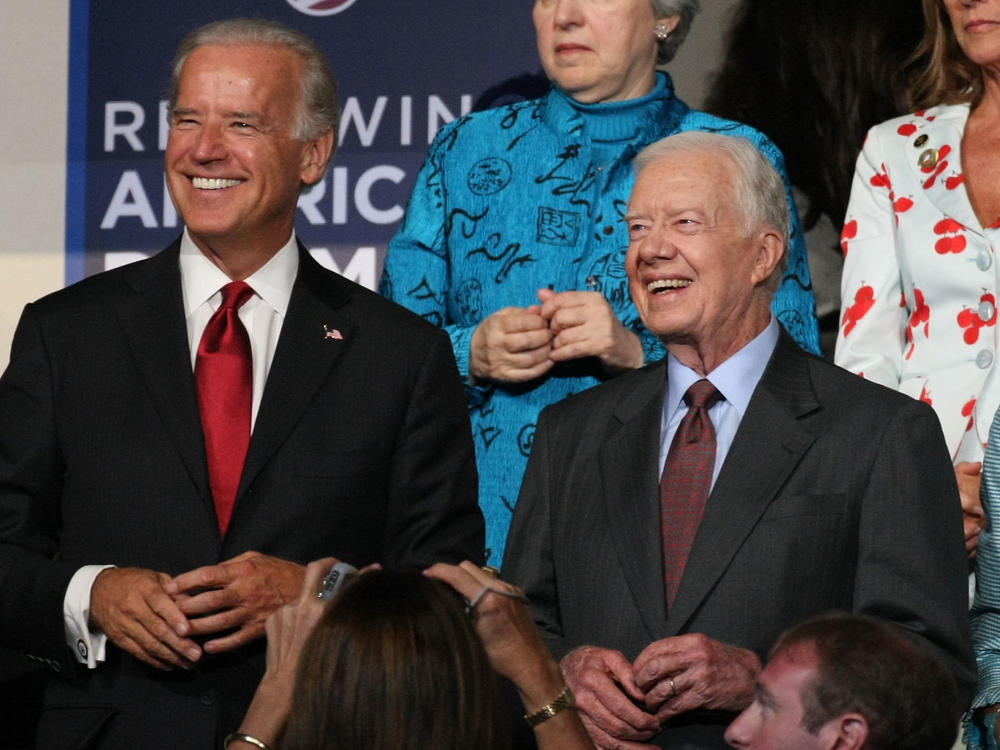 Then-Sen. Joe Biden is seen with former President Jimmy Carter watching the proceedings at the Democratic National Convention in Denver in 2008 where Biden would be the party's vice presidential nominee.