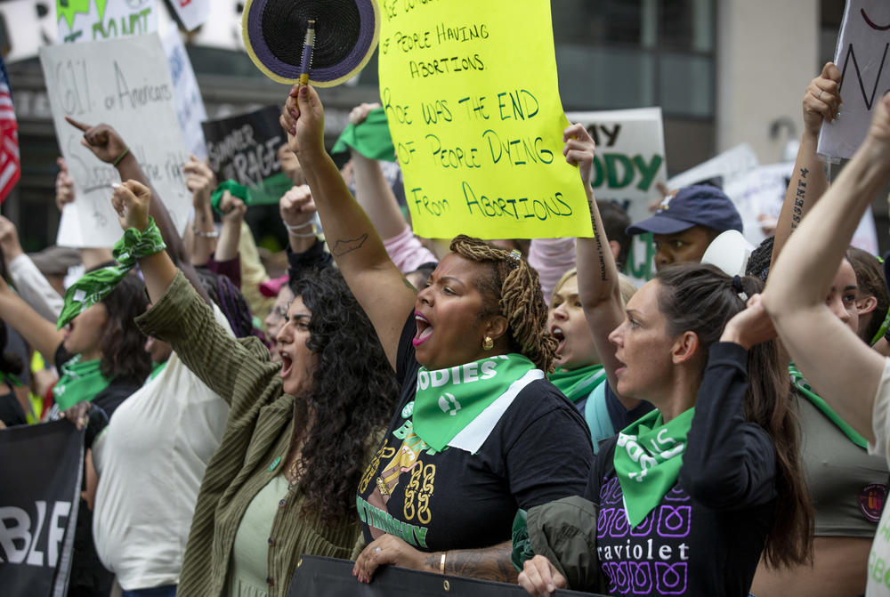Protesters shout at the Women's March in Washington, D.C.