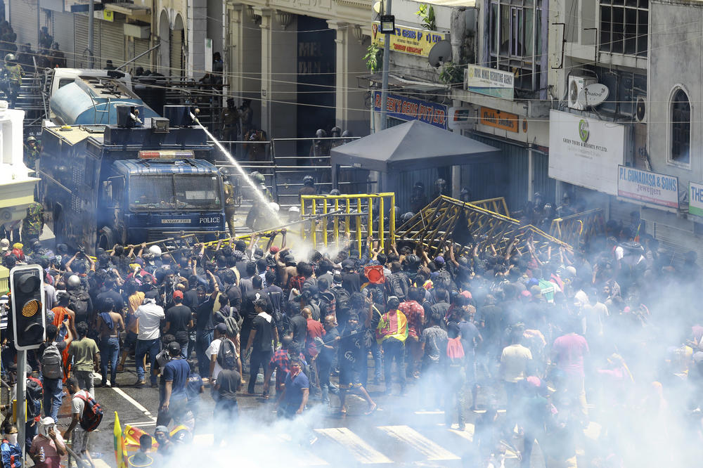 Police use water cannon and tear gas to disperse protesters in Colombo, Sri Lanka, on Saturday.