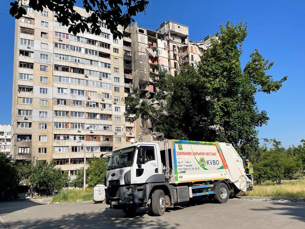 Andrey Taranenko drives a municipal garbage truck through the Saltivka neighborhood of Kharkiv.