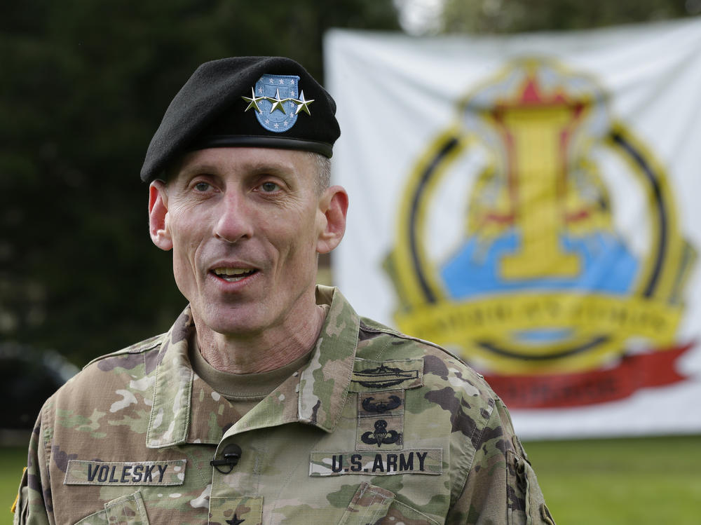 U.S. Army Lt. Gen. Gary Volesky talks to reporters following a change of command ceremony at Joint Base Lewis-McChord in Washington state on April 3, 2017. The Army has suspended Volesky over a recent tweet in response to the first lady.