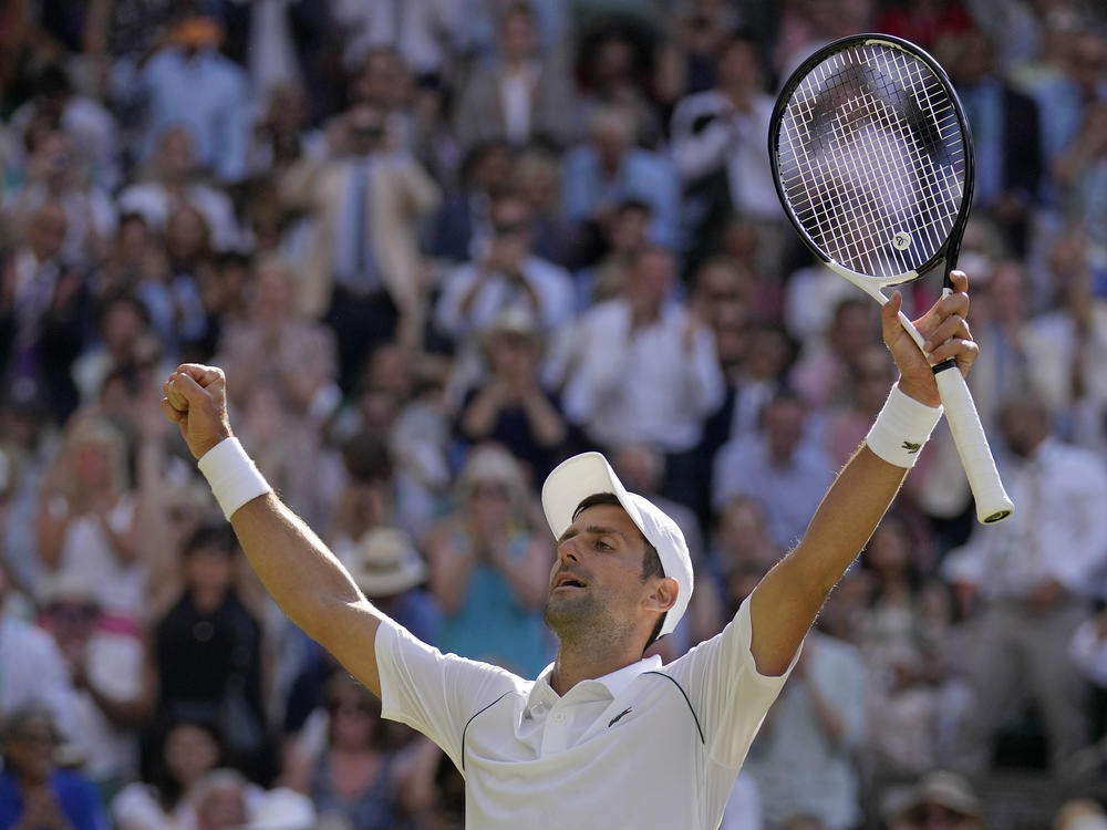 Serbia's Novak Djokovic celebrates winning the Wimbledon men's title on Sunday — his seventh trophy at the British tournament.