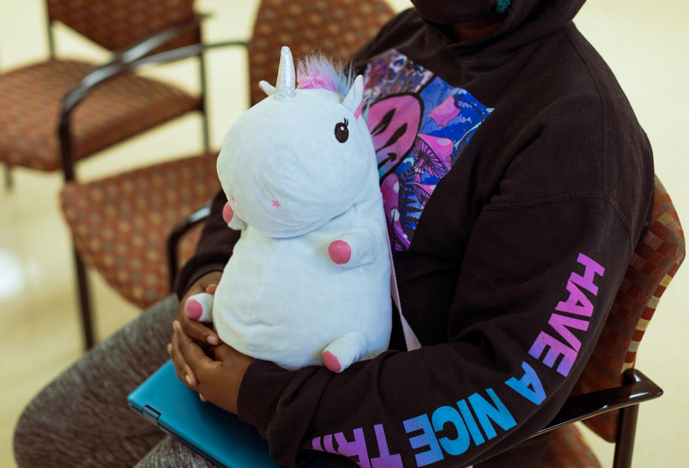 Keanna Tyson holds on to her backpack during a group session at Steve's Club in Atlantic High School. The Club meets every twice a month to talk about what they are going through.