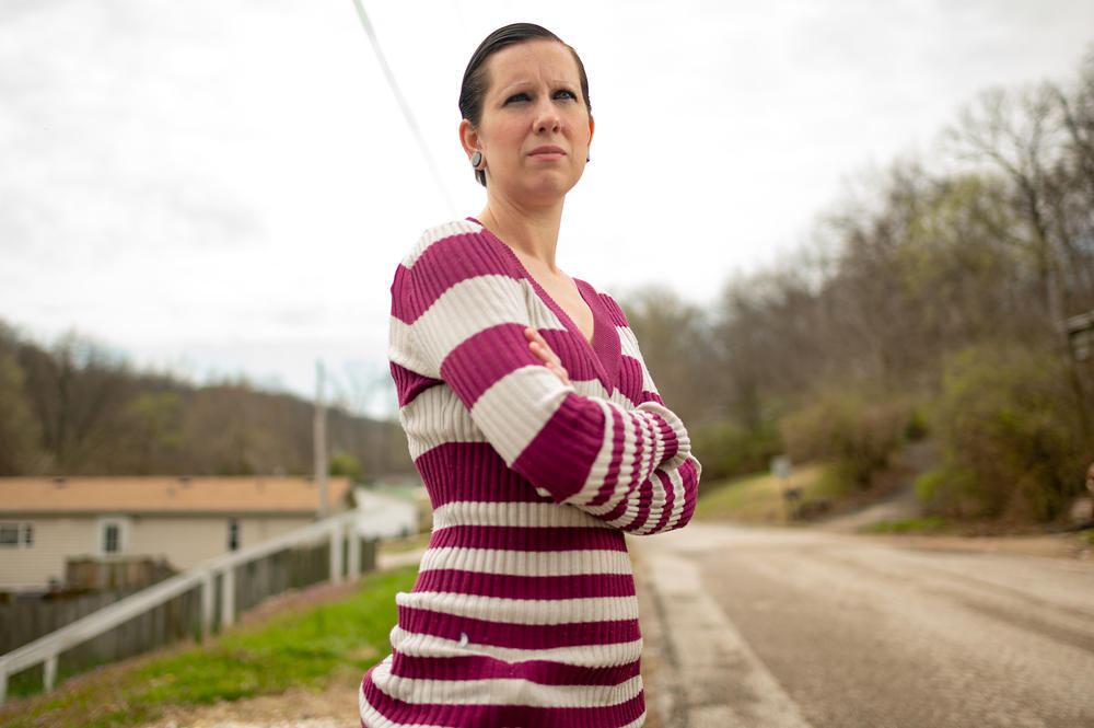 Brittany Bonds poses for a portrait outside her home in Imperial, Missouri in April.