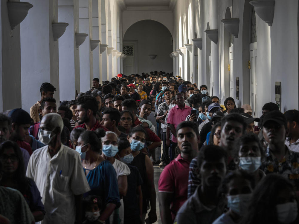 People throng President Gotabaya Rajapaksa's official residence on Tuesday, three days after it was stormed by anti government protesters in Colombo, Sri Lanka.
