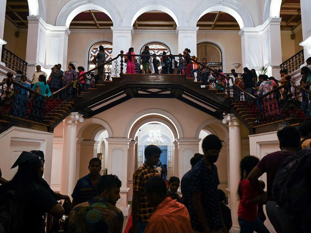 People visit Sri Lankan President Gotabaya Rajapaksa's official residence in Colombo on July 12, 2022, after it was overrun by anti-government protesters on July 9.