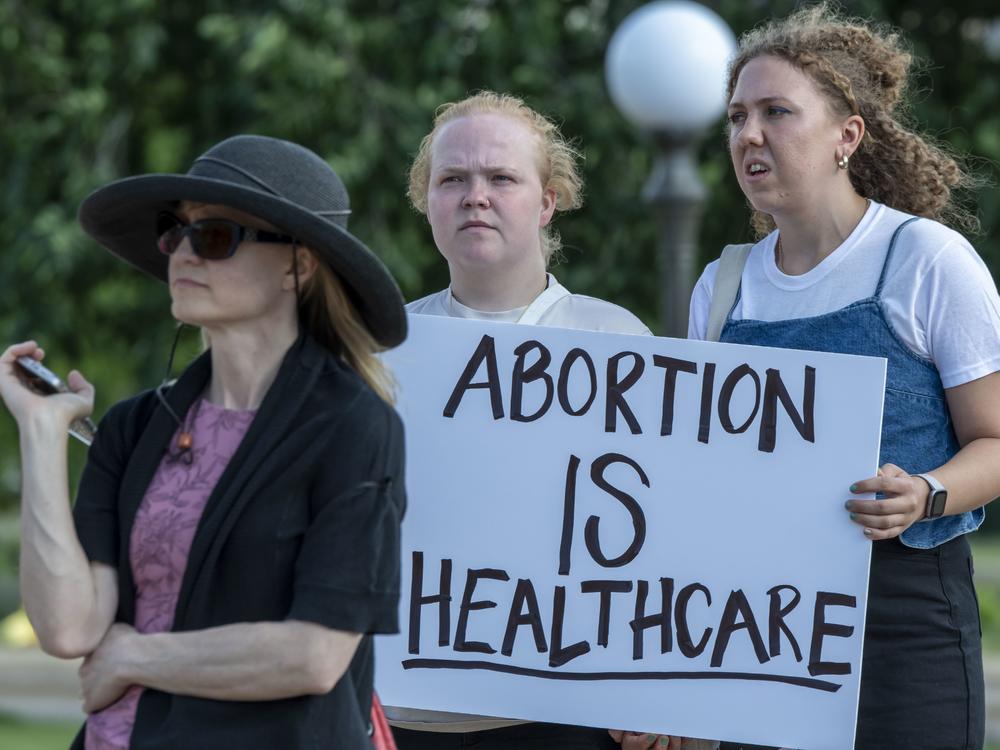 Supporters of abortion rights rally at the Minnesota State Capitol Building in downtown St. Paul following the U.S. Supreme Court ruling to overturn <em>Roe v. Wade</em>.