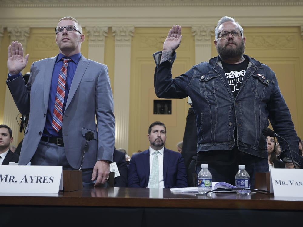 Stephen Ayres, left, who entered the U.S. Capitol illegally on Jan. 6, 2021, and Jason Van Tatenhove, a one-time national spokesman for the Oath Keepers, are sworn-in during the seventh hearing by the House Select Committee to Investigate the January 6th Attack on the U.S. Capitol.