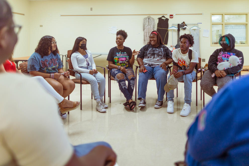 Members of the Steve's Club interact during a group session at the Atlantic High School in Delray Beach, Florida. The Club is a peer support group for students grieving the loss of a parent, a caregiver or, a sibling. It also provides ongoing grief counseling and academic support.