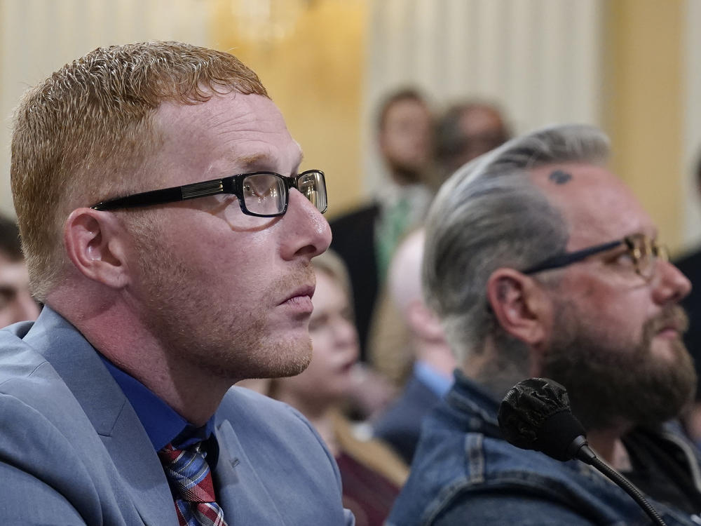 Stephen Ayres, who pleaded guilty in June 2022 to disorderly and disruptive conduct in a restricted building, left, and Jason Van Tatenhove, a former ally of Oath Keepers leader Stewart Rhodes, right, arrive to testify as the House select committee investigating the Jan. 6 attack on Tuesday.