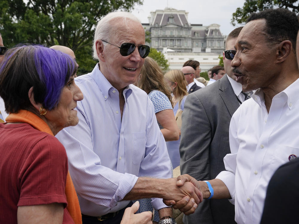Hours before he flew to Israel, President Biden worked the crowd at the congressional picnic at the White House, shaking hands with lawmkers like Rep. Kweisi Mfume, D-Md.