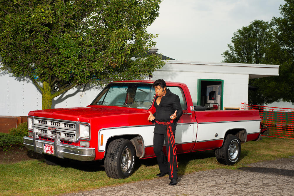 Robert Washington poses at the Michigan Elvisfest on Friday, July 8. Washington has performed as Elvis since 1983.