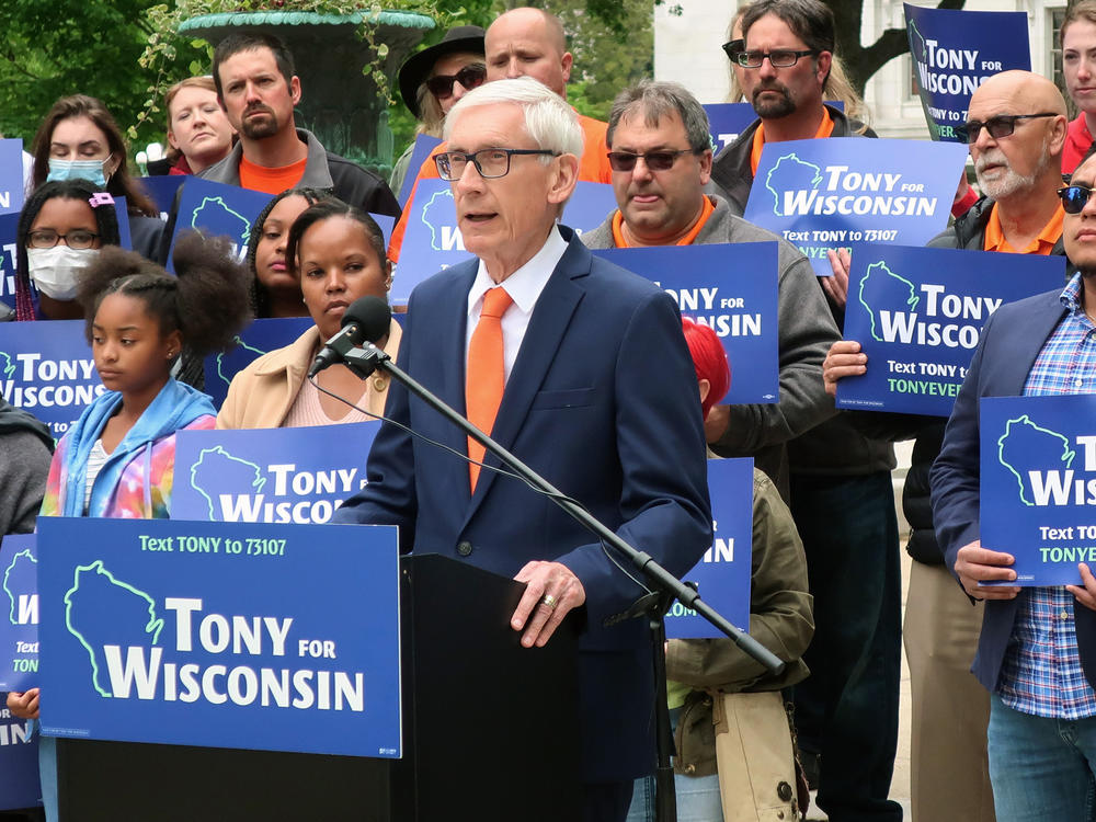 Wisconsin Gov. Tony Evers speaks at a campaign event outside the state Capitol Friday, May 27, 2022, in Madison, Wis.