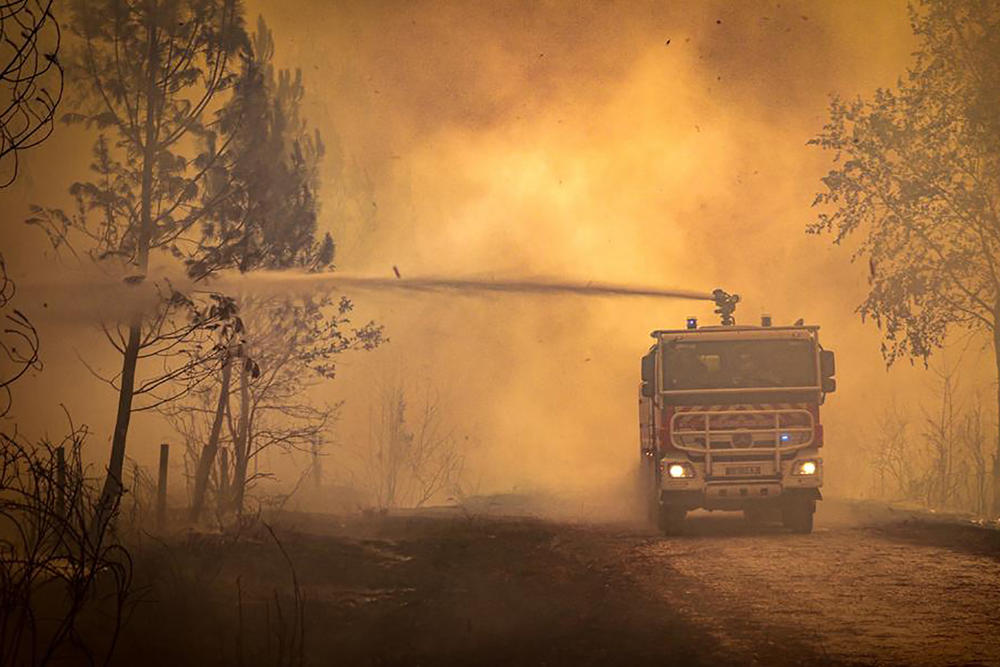 Several hundred firefighters struggled Friday to contain two wildfires in the Bordeaux region of southwest France.