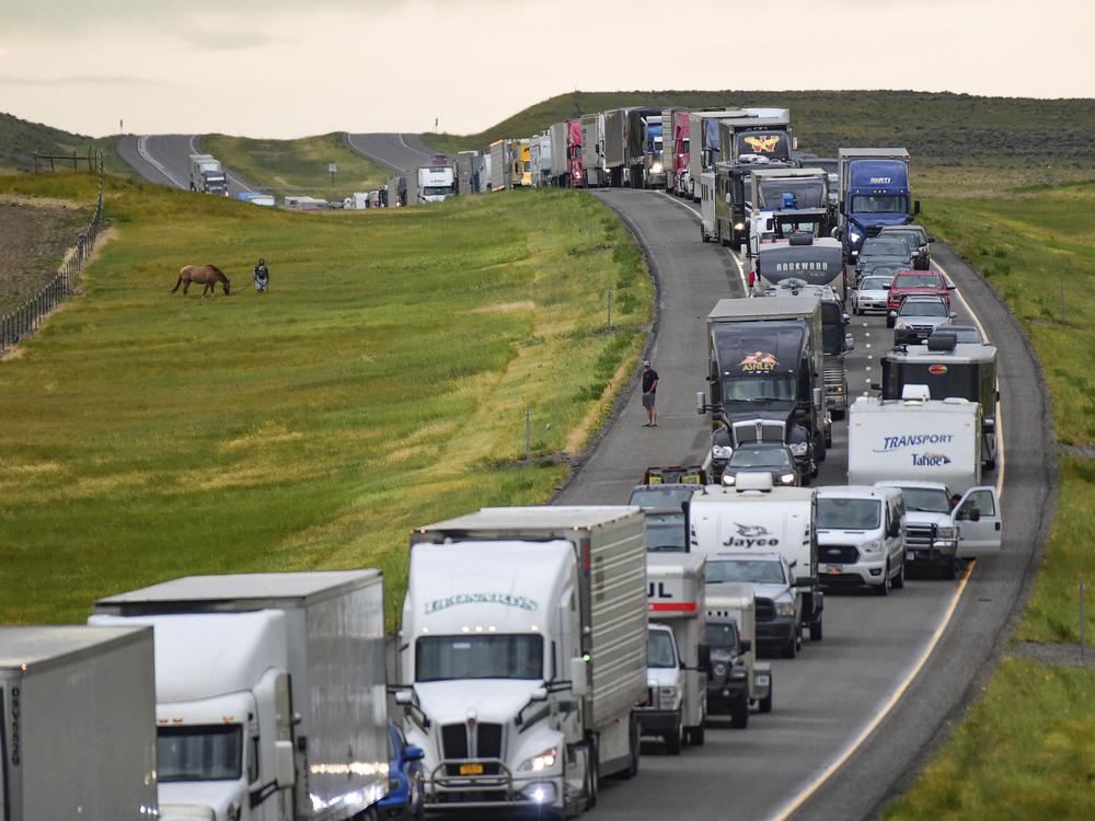 Traffic is backed up on Interstate 90 after a fatal pileup where at least 20 vehicles crashed near Hardin, Mont., on Friday.