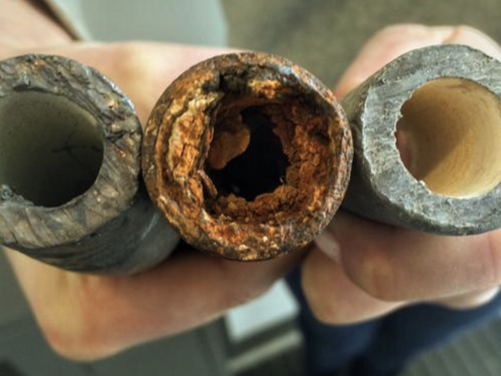 An image provided by the Environmental Protection Agency shows examples of a lead pipe, left, a corroded steel pipe, center, and a lead pipe treated with protective orthophosphate. The EPA is only now requiring water systems to take stock of their lead pipes, decades after new ones were banned.