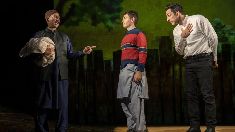 (From left) Evan Zes, Eric Sirakian and Amir Arison in <em>The Kite Runner</em>.