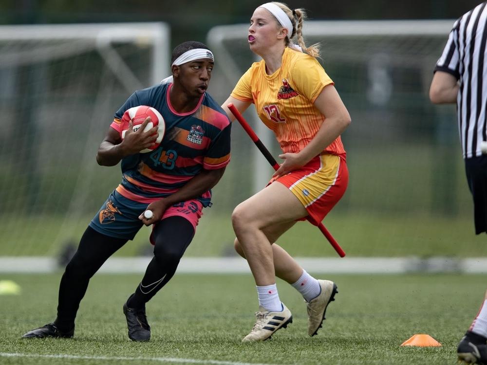 The New York Titans and the Austin Outlaws face off during the 2021 regular Major League Quidditch season last June in Round Rock, Texas. The league and the sports governing bodies announced on Tuesday that the sport is rebranding as quadball.