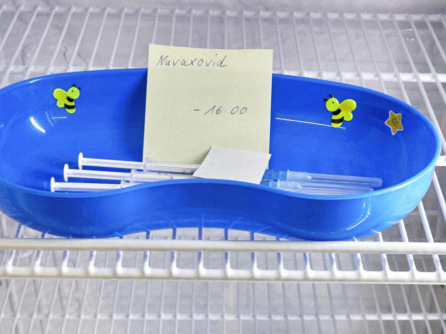 A kidney dish with syringes containing the Novavax COVID-19 vaccine sits in a refrigerator ready for use in February at a vaccination center in Prisdorf, Germany.