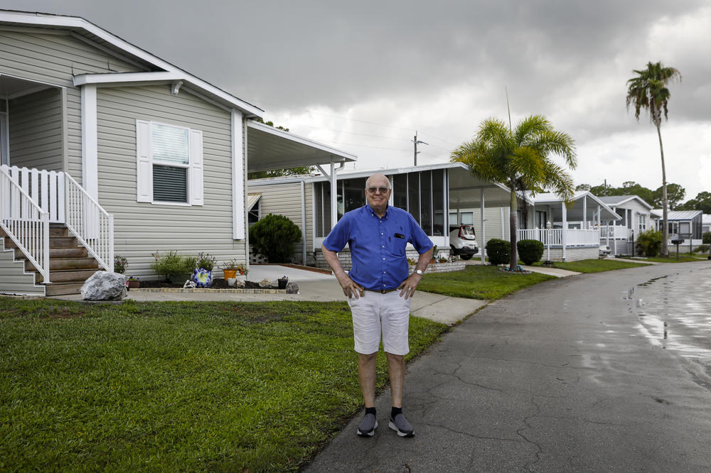 Stanley Paxton at the site where he fell at Heritage Plantation. He and other residents say floodwaters often leave behind a slimy residue that's easy to slip and fall on. Wednesday, June 8, 2022, in Vero Beach.