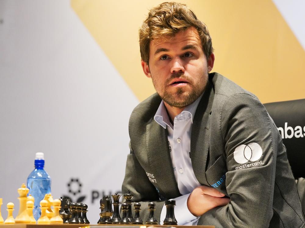 Magnus Carlsen of Norway competes during the FIDE World Championship in in Dubai, United Arab Emirates, on Dec. 10, 2021.