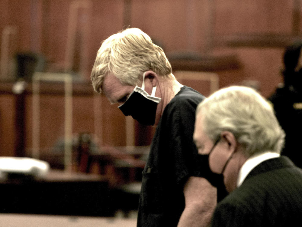 Alex Murdaugh awaits the beginning of his bond hearing in Columbia, S.C., on Oct. 19, 2021. Murdaugh pleaded not guilty on Wednesday to murdering his wife and son.