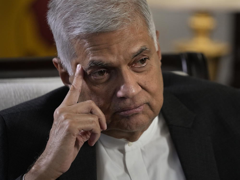 Sri Lanka's Prime Minister Ranil Wickremesinghe gestures during an interview with The Associated Press in Colombo, Sri Lanka, Saturday, June 11, 2022.