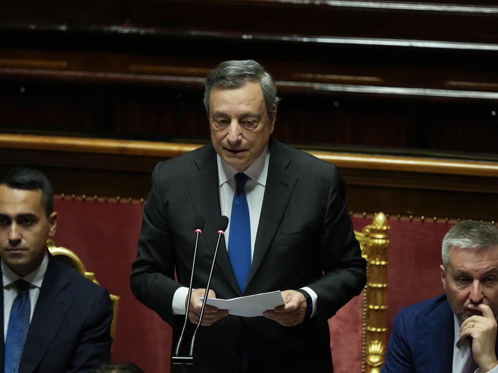 Italian Premier Mario Draghi (center) flanked by Foreign Minister Luigi Di Maio (left) and Defense Minister Lorenzo Guerini, delivers his speech at the Senate in Rome on Wednesday.