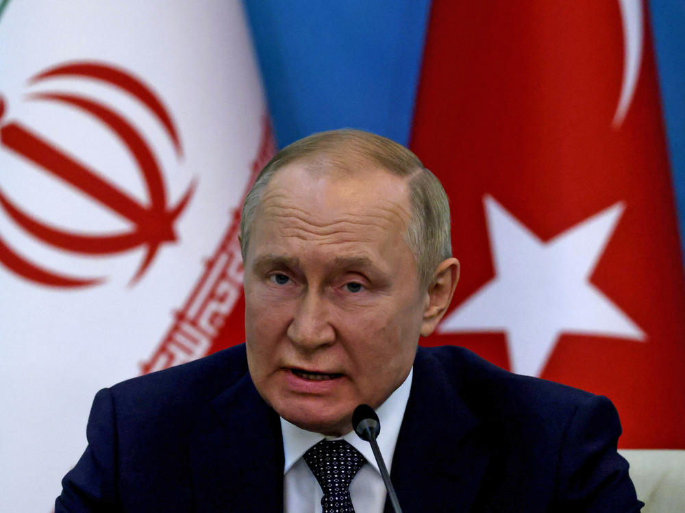 Russian President Vladimir Putin speaks during a joint press conference with his Iranian and Turkish counterparts following their summit in Tehran in July.
