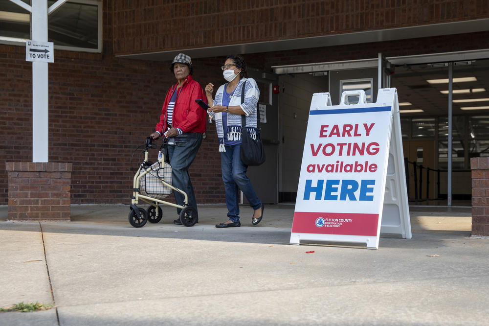Fulton County voters leave an early voting site located inside C.T. Martin Natatorium and Recreation Center in Atlanta on May 18.