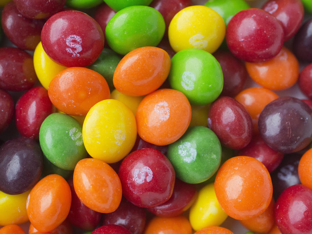 A recent lawsuit against Mars Inc., the company that makes Skittles, points titanium dioxide in the candy. The ingredient is one of thousands of additives allowed in foods under federal regulations.