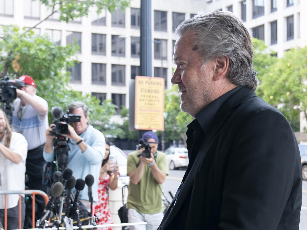 Former White House strategist Steve Bannon arrives at the federal court in Washington on  Friday. Bannon was brought to trial on a pair of federal charges for criminal contempt of Congress after refusing to cooperate with the House committee investigating the U.S. Capitol insurrection on Jan. 6, 2021.