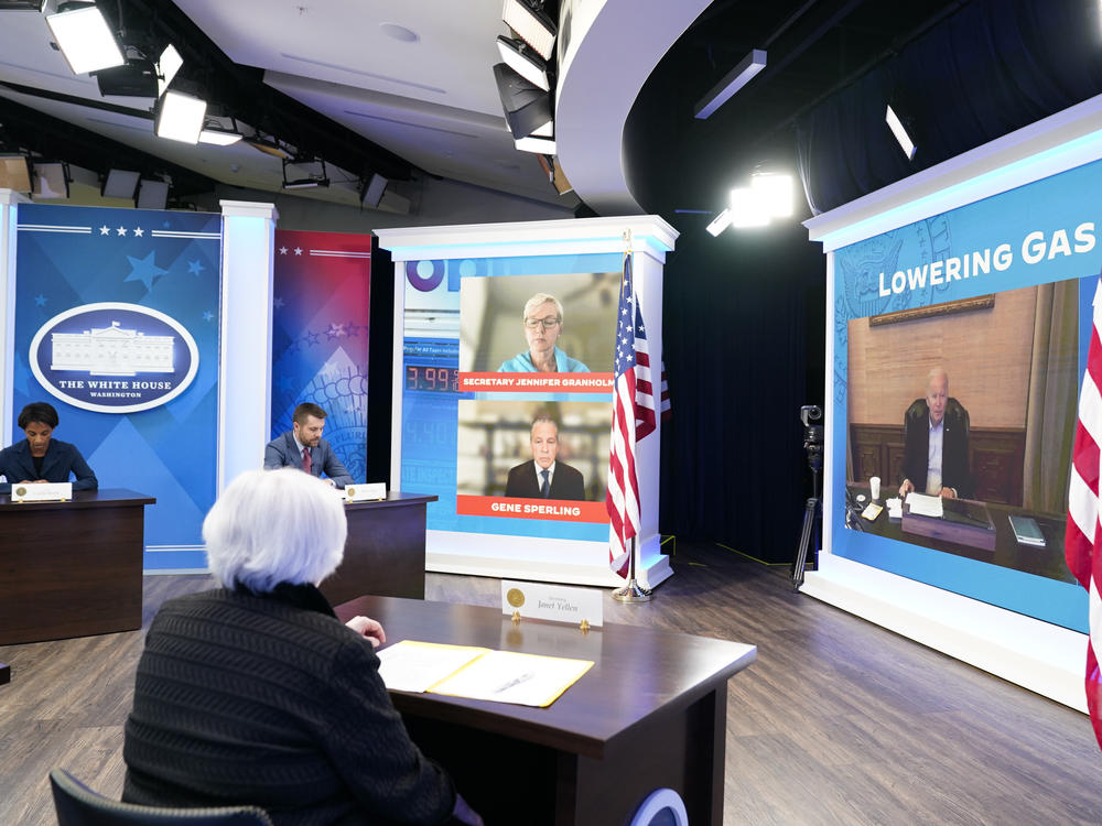 Treasury Secretary Janet Yellen, left, listens as President Joe Biden speaks virtually during a meeting with his economic team in the South Court Auditorium on the White House complex in Washington on Friday.