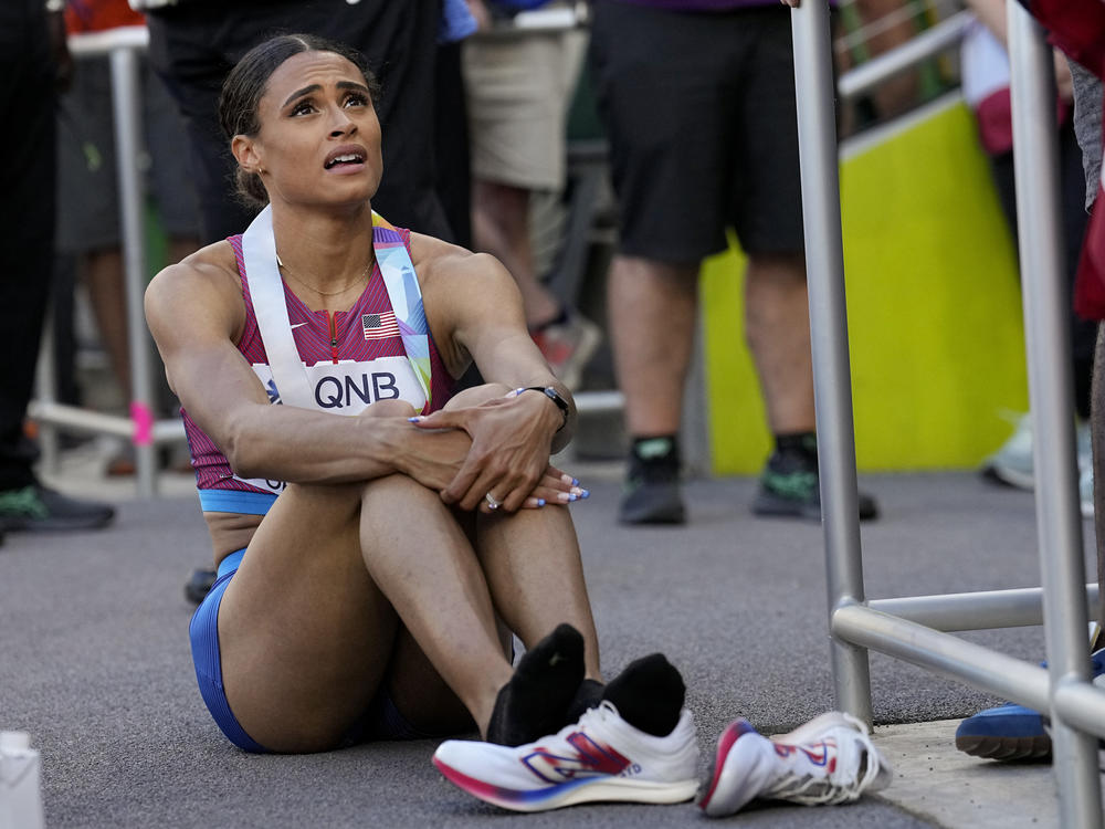 Sydney Mclaughlin, of the United States, recovers after winning the final of the women's 400-meter hurdles at the World Athletics Championships on Friday.