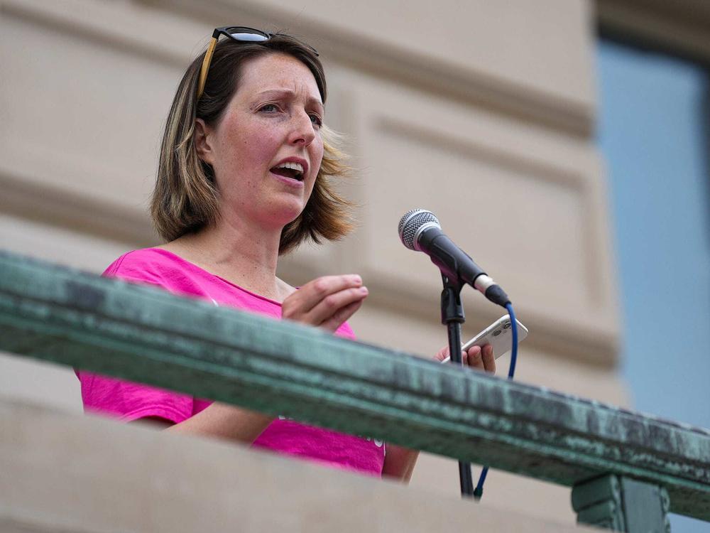 Dr. Caitlin Bernard, the Indiana doctor who provided an abortion to a 10-year-old rape victim from Ohio, speaks during an abortion rights rally in June at the Indiana Statehouse.