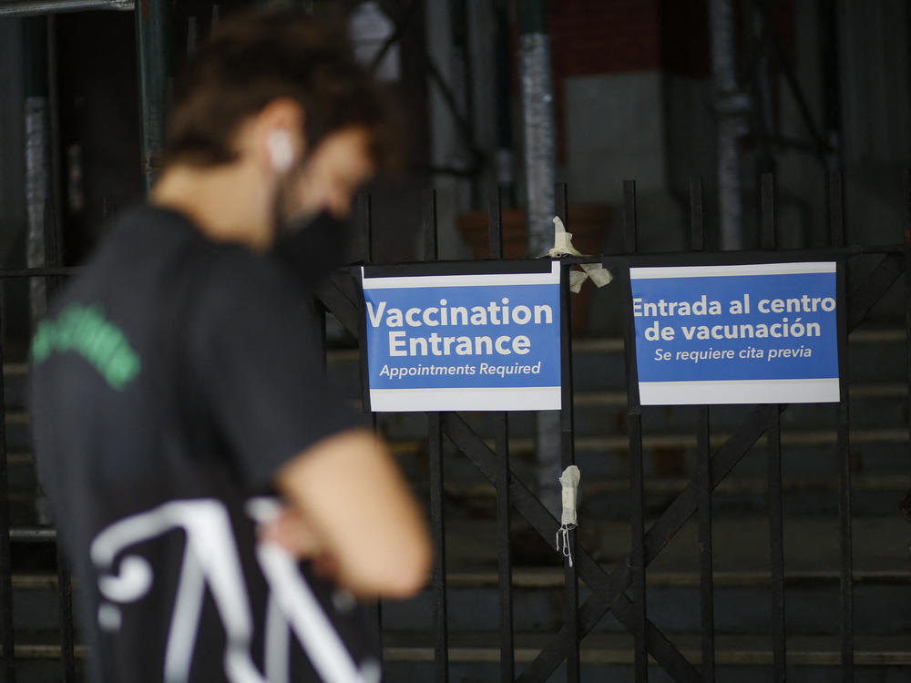 A man waits in line to receive a monkeypox vaccine in Brooklyn, N.Y., earlier this month.