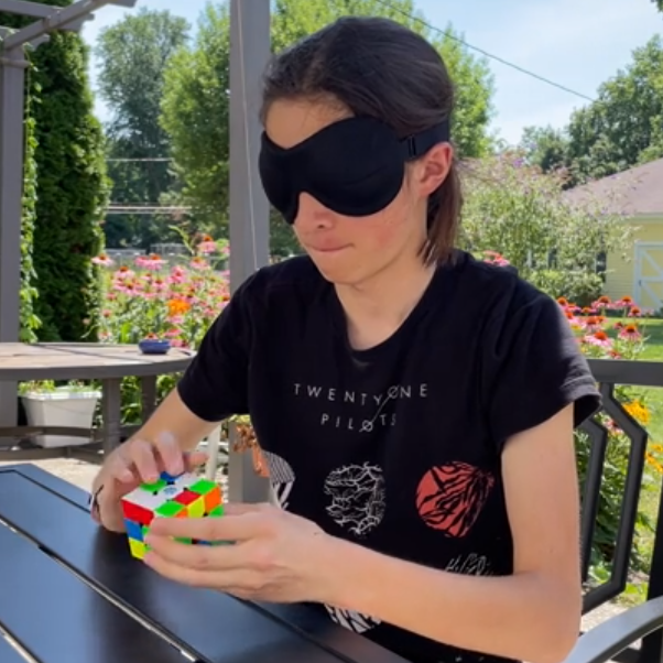 Juan Anselm solving a Rubik's Cube blindfolded.